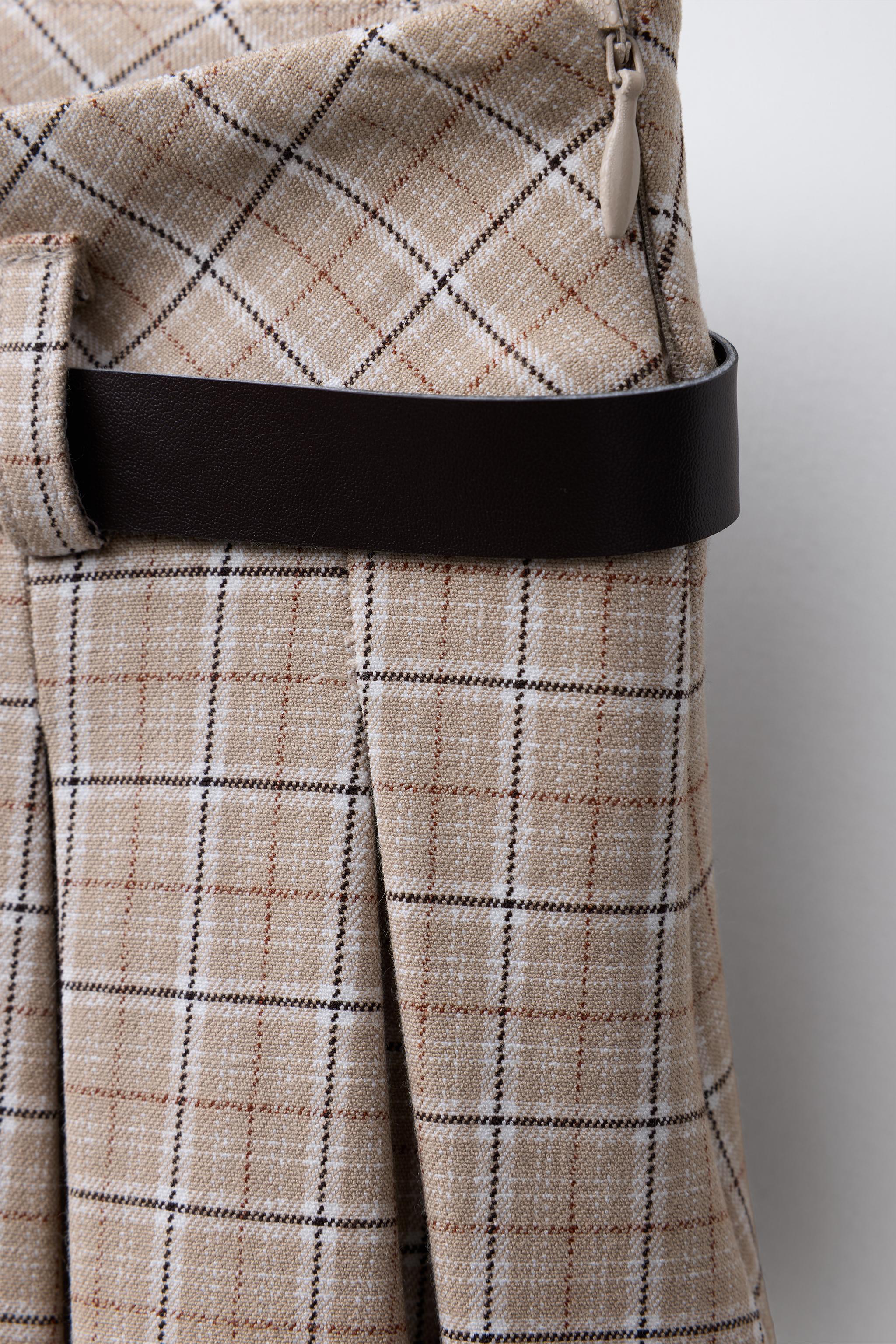 BOX PLEAT BELTED SKIRT